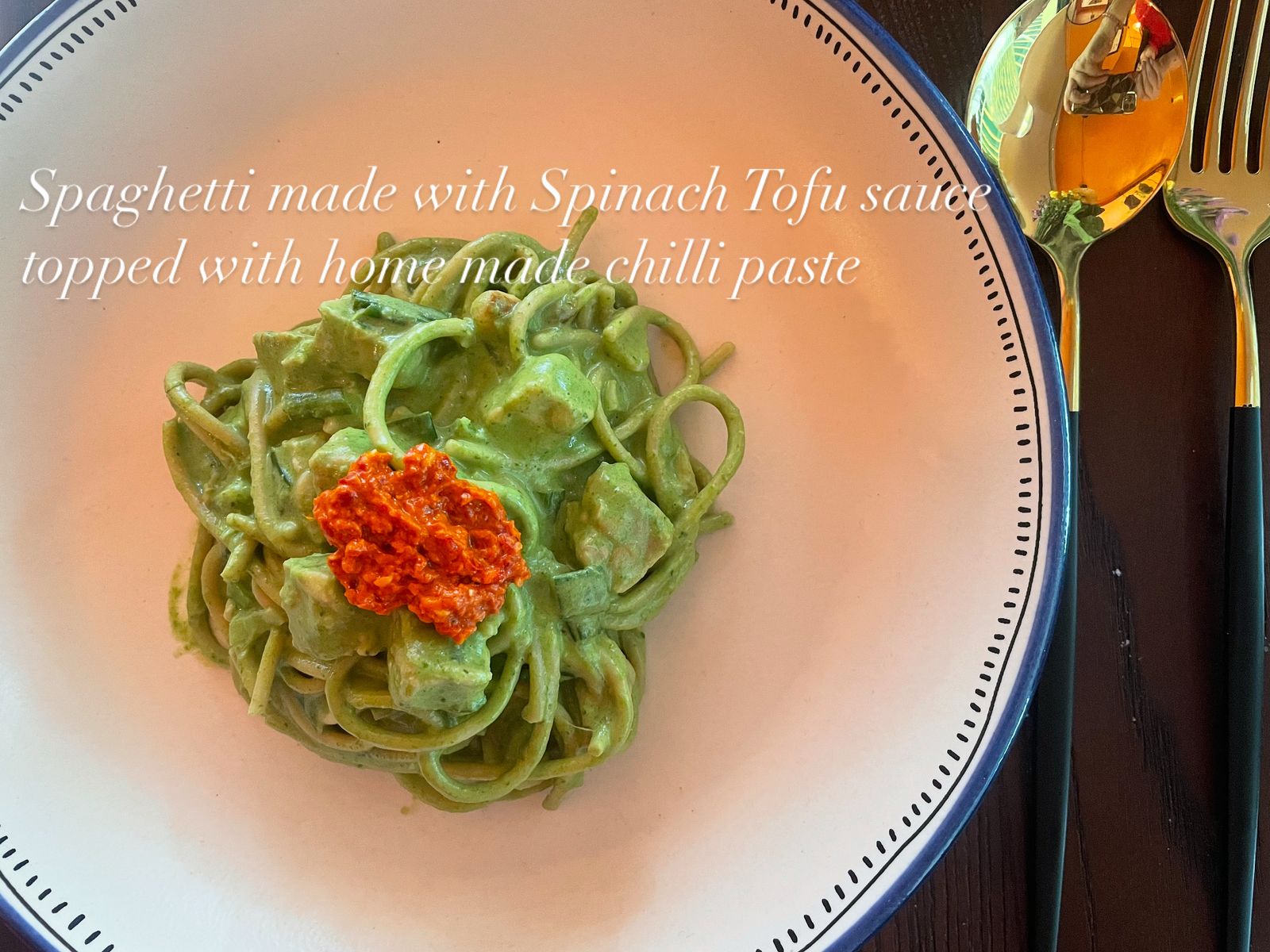 Spaghetti made with Spinach Tofu Souce topped with home made Chilli Paste